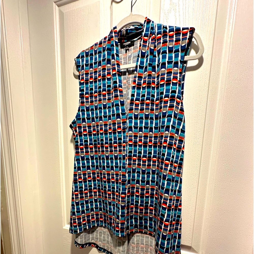 Sleeveless multi colored top. Size XL